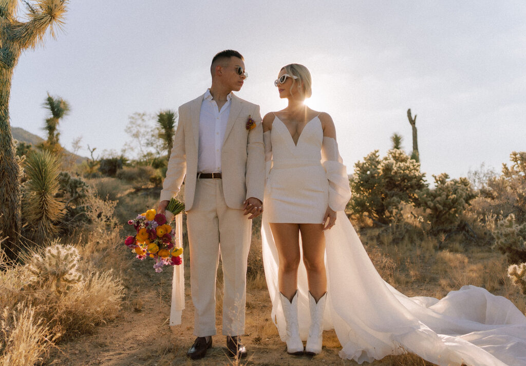 couple looking at each other during their elopement in the desert in Joshua Tree
