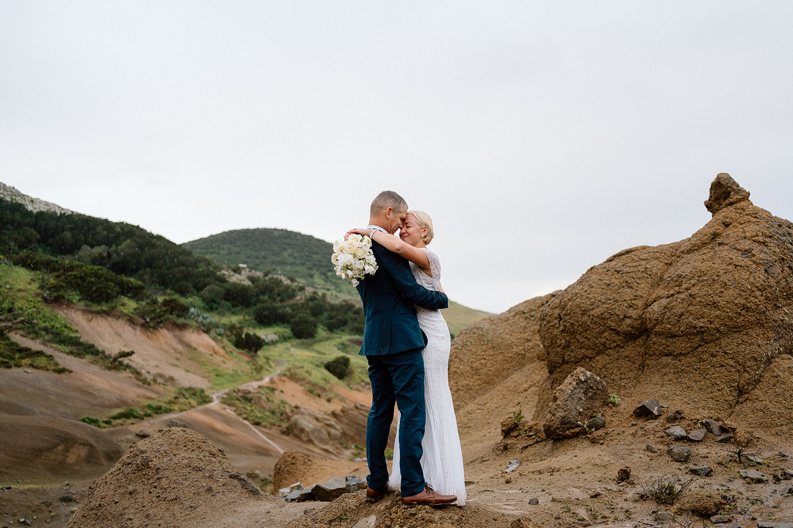 couple hugging in volcanic scenery in Tenerife