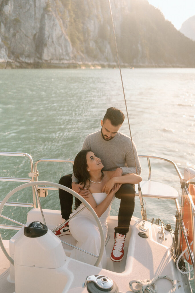photographer captures engaged couple at a sailboat near Vancouver