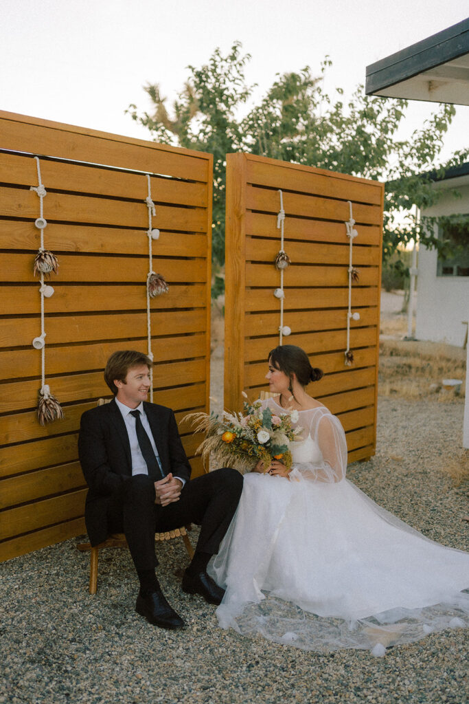 Couple sitting after getting ready together captured by Vancouver photographer