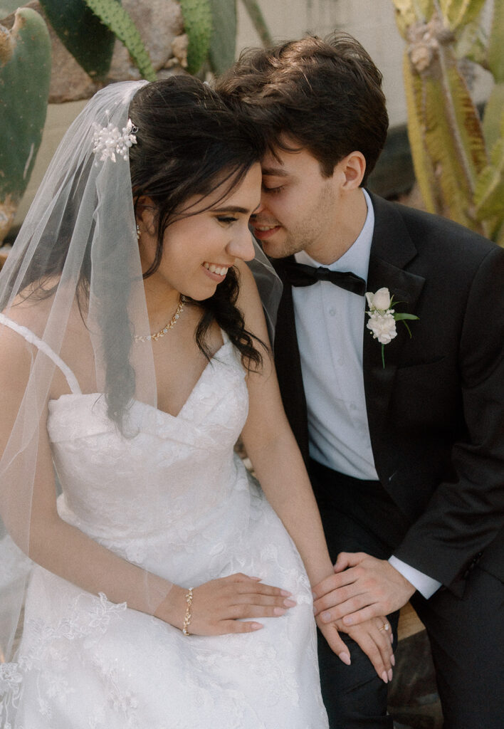 Vancouver wedding photographer captures couple sitting down for portraits